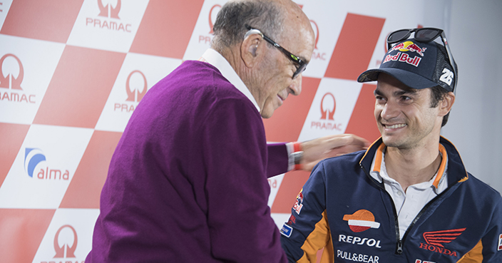 HOHENSTEIN-ERNSTTHAL, GERMANY - JULY 12:  Dani Pedrosa of Spain and Repsol Honda Team  hugs Carmelo Ezpeleta of Spain and Dorna CEO (L) during the press conference in order to announce his retired during the MotoGp of Germany - Previews at Sachsenring Circuit on July 12, 2018 in Hohenstein-Ernstthal, Germany.  (Photo by Mirco Lazzari gp/Getty Images)
