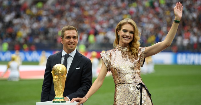 MOSCOW, RUSSIA - JULY 15:  Former German International Footballer, Philipp Lahm and Philanthropist, Natalia Vodianova present the 2018 FIFA World Cup Original Trophy ahead of the 2018 FIFA World Cup Final between France and Croatia at Luzhniki Stadium on July 15, 2018 in Moscow, Russia.  (Photo by Matthias Hangst/Getty Images)