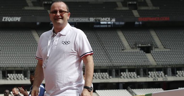 International Olympic Committee Evaluation Commission Chair Patrick Baumann smiles as he visits the Stade de France stadium, Monday May 15, 2017 in Saint-Denis, outside Paris. Paris bid leaders want to capitalize on the sense of optimism surrounding new President Emmanuel Macron to beat Los Angeles and secure the Olympic Games in 2024 — not 2028. (AP Photo/Michel Euler)