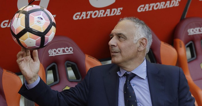 FILE - In this Sunday, May 28, 2017 file photo AS Roma president James Pallotta plays with a ball prior to an Italian Serie A soccer match between Roma and Genoa at the Olympic stadium in Rome, Sunday, May 28, 2017. The American president of the Roma soccer club is running out of patience. If regional authorities don't approve construction of a long-delayed new stadium for the team, Boston executive James Pallotta is prepared to sell the team. (AP Photo/Alessandra Tarantino, File)