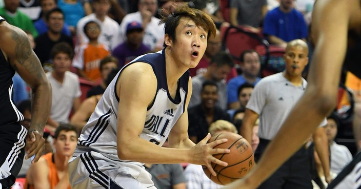 LAS VEGAS, NV - JULY 09:  Ding Yanyuhang #8 of the Dallas Mavericks looks to shoot against the Phoenix Suns during the 2017 Summer League at the Thomas & Mack Center on July 9, 2017 in Las Vegas, Nevada. Dallas won 88-77. NOTE TO USER: User expressly acknowledges and agrees that, by downloading and or using this photograph, User is consenting to the terms and conditions of the Getty Images License Agreement.  (Photo by Ethan Miller/Getty Images)