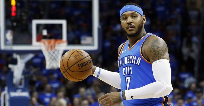 FILE - This is an April 25, 2018, file photo showing Oklahoma City Thunder forward Carmelo Anthony (7) during Game 5 of an NBA basketball first-round playoff series against the Utah Jazz, in Oklahoma City. Carmelo Anthony is done in Oklahoma City. A person with knowledge of the details tells The Associated Press the Thunder are sending the veteran NBA forward and a 2022 protected first-round pick to Atlanta in exchange for Hawks guard Dennis Schroder and Mike Muscala. (AP Photo/Sue Ogrocki, File)