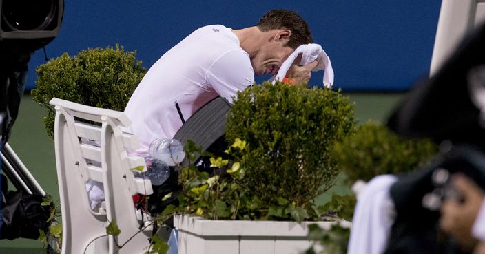 Andy Murray, of Britain, becomes emotional after defeating Marius Copil, of Romania, 6-7(5), 3-6, 7-6(4), during the Citi Open tennis tournament in Washington, Friday, Aug. 3, 2018. (AP Photo/Andrew Harnik)