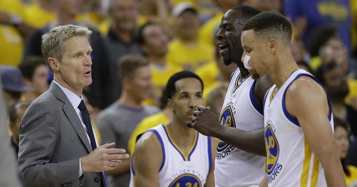 Golden State Warriors head coach Steve Kerr, left, talks with forward Draymond Green (23) and guard Stephen Curry (30) during the second half of Game 1 of basketball's NBA Finals against the Cleveland Cavaliers in Oakland, Calif., Thursday, June 2, 2016. (AP Photo/Marcio Jose Sanchez)