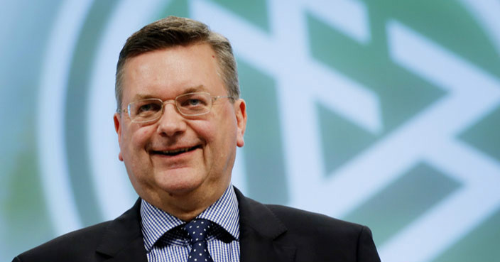 New elected President of German Football Federation Reinhard Grindel poses after a meeting of the German Football Federation DFB in Frankfurt, Germany, Friday, April 15, 2016. (AP Photo/Michael Probst)