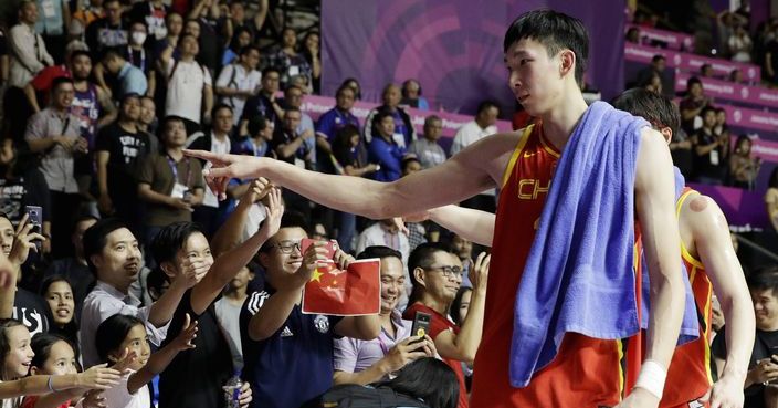 Chinese team celebrate after defeating the Philippines 82-80 in their men's basketball game at the 18th Asian Games in Jakarta, Indonesia on Tuesday, Aug. 21, 2018. (AP Photo/Aaron Favila)