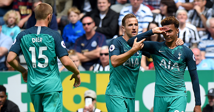 NEWCASTLE UPON TYNE, ENGLAND - AUGUST 11:  Dele Alli of Tottenham Hotspur celebrates with teammate Harry Kane after scoring his team's second goal during the Premier League match between Newcastle United and Tottenham Hotspur at St. James Park on August 11, 2018 in Newcastle upon Tyne, United Kingdom.  (Photo by Tony Marshall/Getty Images)