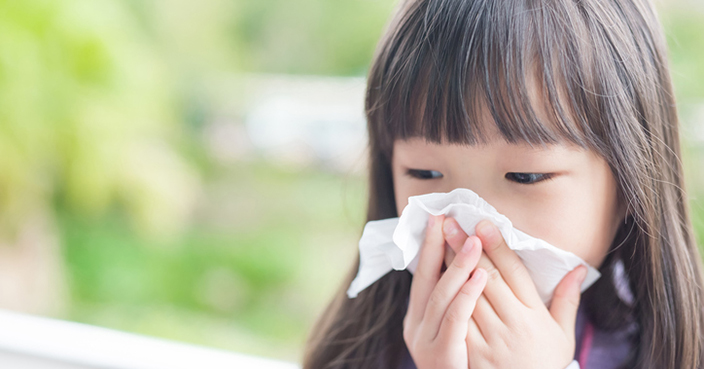 little girl get cold and blow her nose,  asian