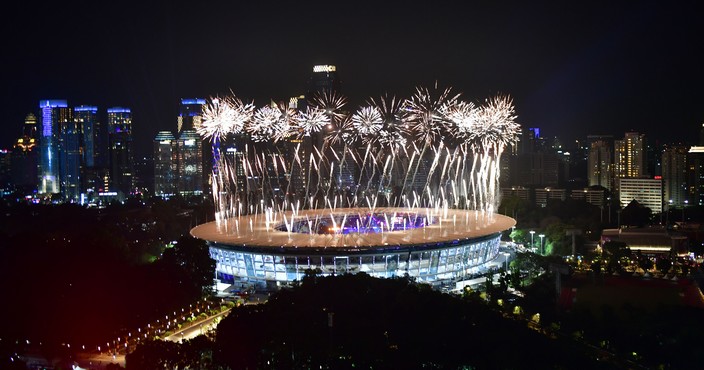 TOPSHOT - Fireworks explode over the Gelora Bung Karno main stadium durinh the opening ceremony of the 2018 Asian Games in Jakarta on August 18, 2018. (Photo by MONEY SHARMA / AFP)        (Photo credit should read MONEY SHARMA/AFP/Getty Images)