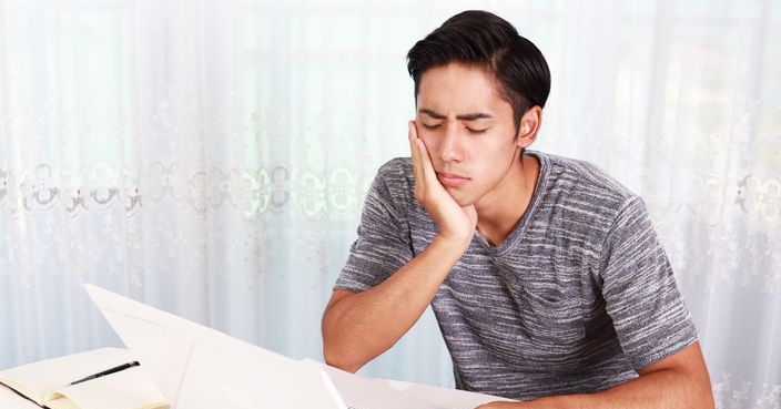 Portrait of an Asian man at home.