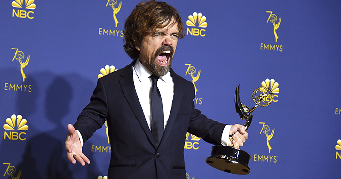 Peter Dinklage poses in the press room with the award for outstanding supporting actor in a drama series for 