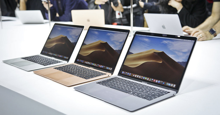 Apple's new MacBook Air computers on display during the company's showcase of new products Tuesday Oct. 30, 2018, in the Brooklyn borough of New York. (AP Photo/Bebeto Matthews)