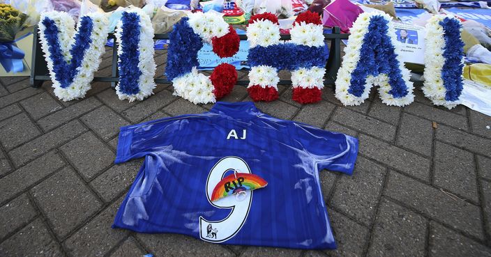 Floral tributes at Leicester City soccer club Friday Nov. 2, 2018, for Leicester Chairman, Vichai Srivaddhanaprabha, who was among those who lost their lives on Saturday evening when a helicopter carrying him and four other people crashed outside King Power Stadium.  After canceling an English League Cup match scheduled for last Tuesday, Leicester will return to action in a league match at Cardiff on upcoming Saturday, the day Vichai's funeral begins in his native Thailand. (Nigel French/PA via AP)