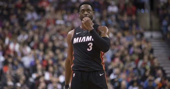 Miami Heat's Dwyane Wade reacts during his team's 125-115 loss to the Toronto Raptors in an NBA basketball game in Toronto on Sunday, Nov. 25, 2018. (Chris Young/The Canadian Press via AP)