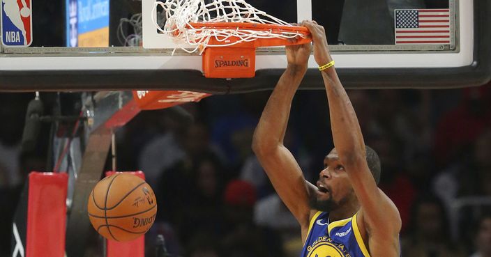 Golden State Warriors forward Kevin Durant (35) scores during the first half of an NBA basketball game against the Atlanta Hawks Monday, Dec. 3, 2018, in Atlanta. (AP Photo/John Bazemore)