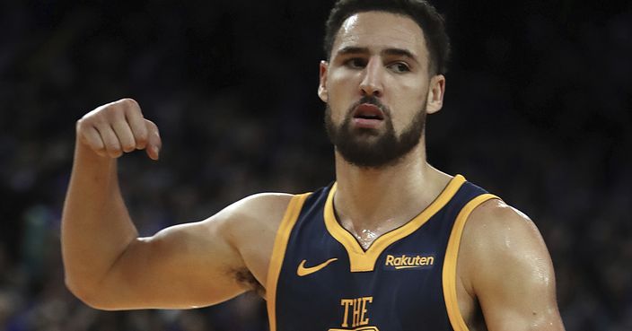 Golden State Warriors' Klay Thompson celebrates after making the final score of the team's NBA basketball game against the Sacramento Kings on Saturday, Nov. 24, 2018, in Oakland, Calif. (AP Photo/Ben Margot)