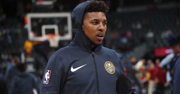 Newly-signed Denver Nuggets guard Nick Young warms up before facing the Memphis Grizzlies in the first half of an NBA basketball game Monday, Dec. 10, 2018, in Denver. (AP Photo/David Zalubowski)