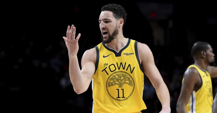 Golden State Warriors guard Klay Thompson reacts after hitting a shot late in the second half of the team's NBA basketball game against the Portland Trail Blazers in Portland, Ore., Saturday, Dec. 29, 2018. The Warriors won 115-105. (AP Photo/Steve Dykes)
