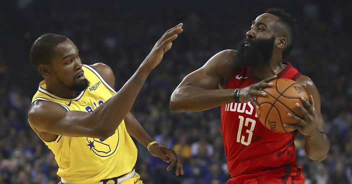 Golden State Warriors' Kevin Durant, left, defends against Houston Rockets' James Harden during the first half of an NBA basketball game Thursday, Jan. 3, 2019, in Oakland, Calif. (AP Photo/Ben Margot)