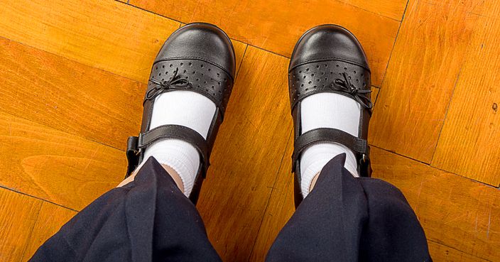 Young School Girl Student Wearing Black Shoes and White Socks - Top View