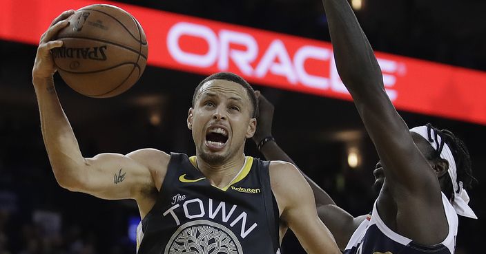 Golden State Warriors' Stephen Curry shoots against New Orleans Pelicans' Jrue Holiday during the second half of an NBA basketball game Wednesday, Jan. 16, 2019, in Oakland, Calif. (AP Photo/Ben Margot)
