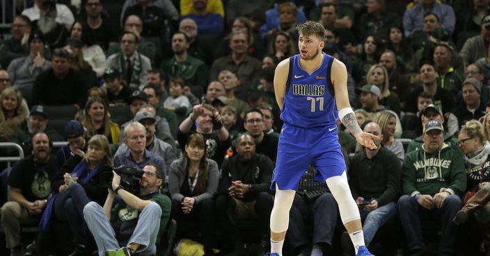 Dallas Mavericks' Luka Doncic reacts during the first half of an NBA basketball game against the Milwaukee Bucks, Monday, Jan. 21, 2019, in Milwaukee. (AP Photo/Aaron Gash)