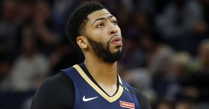 FILE- In this Jan. 12, 2019, file photo New Orleans Pelicans' Anthony Davis plays against the Minnesota Timberwolves in an NBA basketball game in Minneapolis. Davis' agent says the five-time All-Star has told the New Orleans Pelicans that he wants to be traded to a contending team. Agent Rich Paul confirmed the request to The Associated Press early Monday, Jan. 28. (AP Photo/Jim Mone, File)