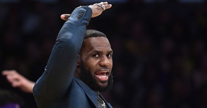 Los Angeles Lakers' LeBron James gestures from the bench during the second half of an NBA basketball game against the Cleveland Cavaliers Sunday, Jan. 13, 2019, in Los Angeles. The Cavaliers won 101-95. (AP Photo/Mark J. Terrill)