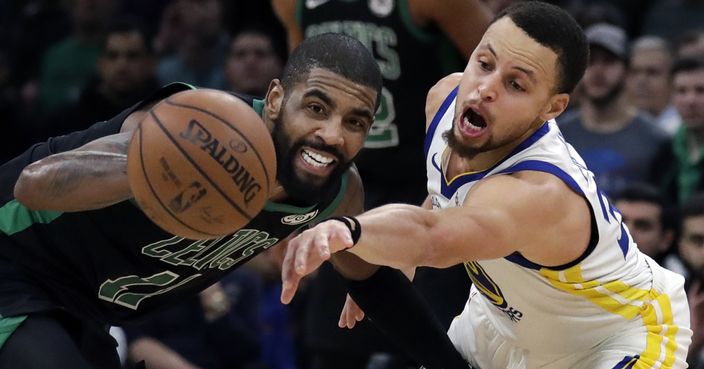 Golden State Warriors guard Stephen Curry, right, attempts to steal the ball from Boston Celtics guard Kyrie Irving (11) in the fourth quarter of an NBA basketball game, Saturday, Jan. 26, 2019, in Boston.