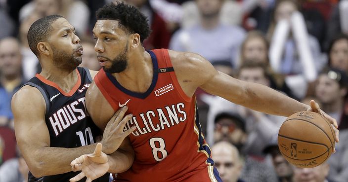 New Orleans Pelicans center Jahlil Okafor (8) dribbles as Houston Rockets guard Eric Gordon defends during the second half of an NBA basketball game Tuesday, Jan. 29, 2019, in Houston. New Orleans won 121-116. (AP Photo/Eric Christian Smith)