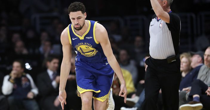 Golden State Warriors' Klay Thompson reacts after making a 3-point basket against the Los Angeles Lakers during the first half of an NBA basketball game, Monday, Jan. 21, 2019, in Los Angeles. (AP Photo/Marcio Jose Sanchez)