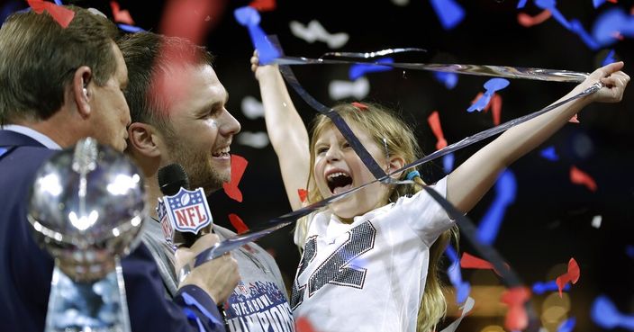 New England Patriots' Tom Brady celebrates with his daughter, Vivian, after the NFL Super Bowl 53 football game against the Los Angeles Rams, Sunday, Feb. 3, 2019, in Atlanta. The Patriots won 13-3. (AP Photo/David J. Phillip)