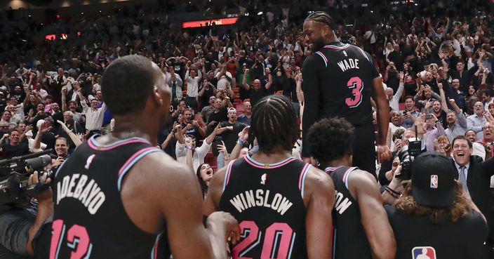 Miami Heat guard Dwyane Wade (3) celebrates after the Heat defeated the Golden State Warriors 126-125 in an NBA basketball game Wednesday, Feb. 27, 2019, in Miami. (AP Photo/Brynn Anderson)