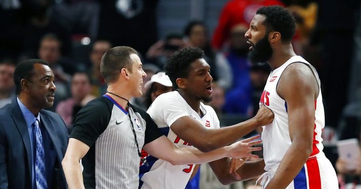 Detroit Pistons guard Langston Galloway holds back center Andre Drummond after Minnesota Timberwolves forward Taj Gibson fouled Drummond during the second half of an NBA basketball game against the Minnesota Timberwolves, Wednesday, March 6, 2019, in Detroit. Gibson was ejected from the game. (AP Photo/Carlos Osorio)