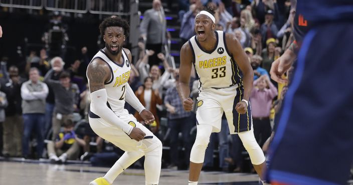 Indiana Pacers' Wesley Matthews (23) and Myles Turner (33) celebrate during the second half of an NBA basketball game against the Oklahoma City Thunder,Thursday, March 14, 2019, in Indianapolis. Indiana won 108-106. (AP Photo/Darron Cummings)