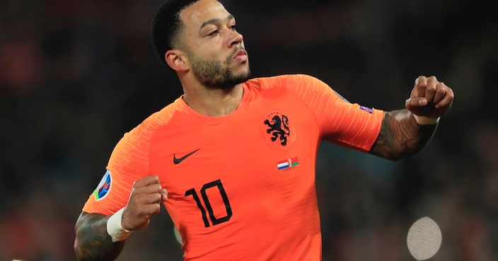 Netherlands' Memphis Depay celebrates after scoring his side's third goal during their Euro 2020 group C qualifying soccer match between Netherlands and Belarus at the Feyenoord stadium in Rotterdam, Netherlands, Thursday, March 21, 2019. (AP Photo/Peter Dejong)