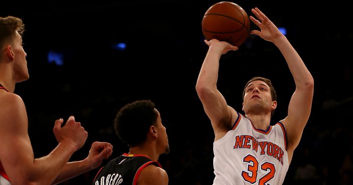 NEW YORK, NY - MARCH 01:  Jimmer Fredette #32 of the New York Knicks is fouled by Brian Roberts #2 of the Portland Trail Blazers as he takes a shot in the fourth quarter at Madison Square Garden on March 1, 2016 in New York City.The Portland Trail Blazers defeated the New York Knicks 104-85. NOTE TO USER: User expressly acknowledges and agrees that, by downloading and or using this photograph, User is consenting to the terms and conditions of the Getty Images License Agreement.  (Photo by Elsa/Getty Images)