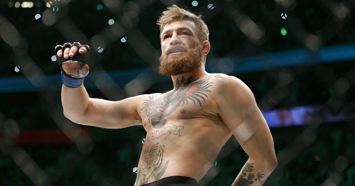 FILE - In this Oct. 6, 2018, file photo, Conor McGregor walks in the cage before fighting Khabib Nurmagomedov in a lightweight title mixed martial arts bout at UFC 229 in Las Vegas.  Superstar UFC fighter McGregor has announced on social media that he is retiring from mixed martial arts. McGregor’s verified Twitter account had a post early Tuesday, March 26, 2019,  that said the former featherweight and lightweight UFC champion was making a “quick announcement.” (AP Photo/John Locher, File)