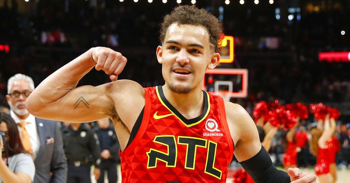 Atlanta Hawks guard Trae Young (11) reacts after the Hawks won in overtime of an NBA basketball game against the Milwaukee Bucks, Sunday, March 31, 2019, in Atlanta. (AP Photo/Todd Kirkland)