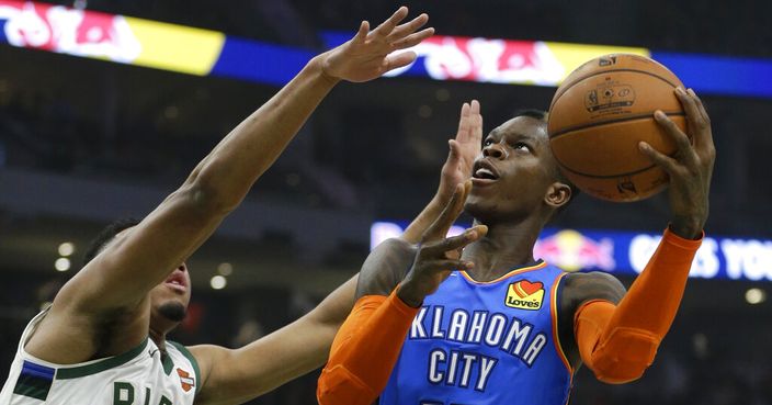 Oklahoma City Thunder's Dennis Schroder shoots against Milwaukee Bucks' Bonzie Colson during the first half of an NBA basketball game Wednesday, April 10, 2019, in Milwaukee. (AP Photo/Aaron Gash)