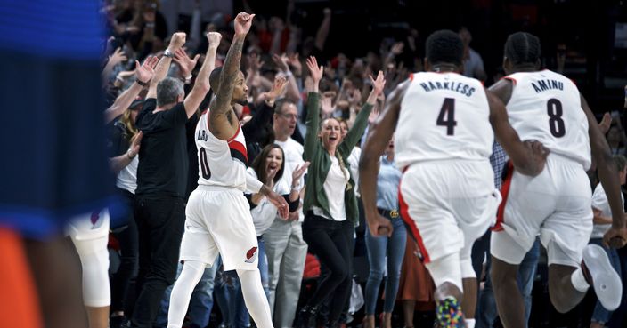 Portland Trail Blazers guard Damian Lillard reacts after making the game-winning shot at the buzzer against the Oklahoma City Thunder in Game 5 of an NBA basketball first-round playoff series, Tuesday, April 23, 2019, in Portland, Ore. The Trail Blazers won 118-115. (AP Photo/Craig Mitchelldyer)