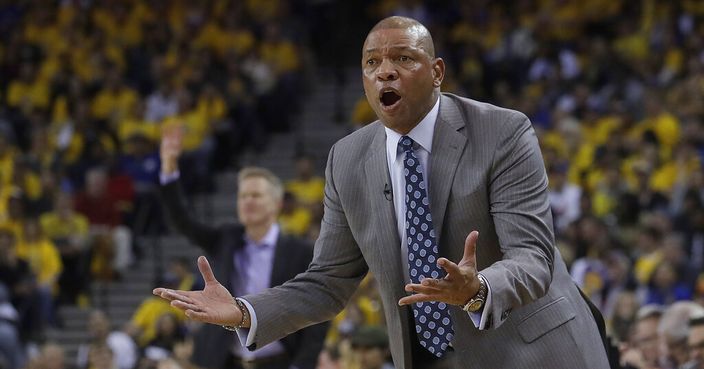 Los Angeles Clippers head coach Doc Rivers gestures toward an official during the first half of Game 2 of a first-round NBA basketball playoff series against the Golden State Warriors in Oakland, Calif., Monday, April 15, 2019. (AP Photo/Jeff Chiu)