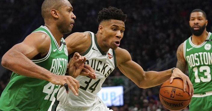 Milwaukee Bucks' Giannis Antetokounmpo tries to drive past Boston Celtics' Al Horford during the first half of Game 5 of a second round NBA basketball playoff series Wednesday, May 8, 2019, in Milwaukee. (AP Photo/Morry Gash)