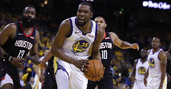 Houston Rockets' James Harden, left, and Golden State Warriors' Kevin Durant (35) react to a referee's call during the second half of Game 5 of a second-round NBA basketball playoff series Wednesday, May 8, 2019, in Oakland, Calif. (AP Photo/Ben Margot)