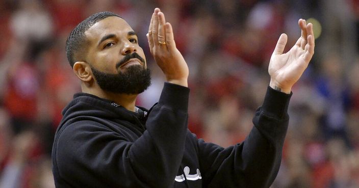 Drake cheers from courtside during the first half of Game 6 of the NBA basketball playoffs Eastern Conference finals between the Toronto Raptors and the Milwaukee Bucks on Saturday, May 25, 2019, in Toronto. (Nathan Denette/The Canadian Press via AP)