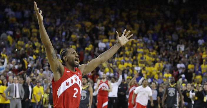 Toronto Raptors forward Kawhi Leonard celebrates after the Raptors defeated the Golden State Warriors in Game 6 of basketball's NBA Finals in Oakland, Calif., Thursday, June 13, 2019. (AP Photo/Ben Margot)