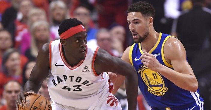 Toronto Raptors forward Pascal Siakam (43) controls the ball against Golden State Warriors guard Klay Thompson (11) during first-half basketball game action in Game 5 of the NBA Finals in Toronto, Monday, June 10, 2019. (Frank Gunn/The Canadian Press via AP)