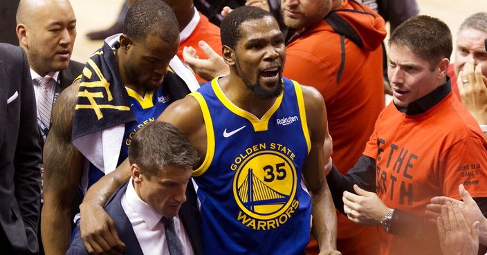 FILE - In this June 10, 2019, file photo, Golden State Warriors forward Kevin Durant (35) reacts as he leaves the court after sustaining an injury during first-half basketball action against the Toronto Raptors in Game 5 of the NBA Finals in Toronto. Durant is headed to the Brooklyn Nets, leaving the Warriors after three seasons. His decision was announced Sunday, June 30, 2019, at the start of the NBA free agency period on the Instagram page for The Boardroom, an online series looking at sports business produced by Durant and business partner Rich Kleiman. (Chris Young/The Canadian Press via AP, File)
