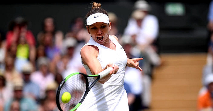 LONDON, ENGLAND - JULY 13: Simona Halep of Romania plays a forehand in her Ladies' Singles final against Serena Williams of The United States during Day twelve of The Championships - Wimbledon 2019 at All England Lawn Tennis and Croquet Club on July 13, 2019 in London, England. (Photo by Laurence Griffiths/Getty Images)