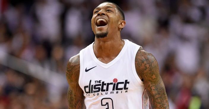 Washington Wizards guard Bradley Beal (3) reacts after hitting a three-point basket during the first half of Game 3 of an NBA basketball first-round playoff series against the Toronto Raptors, Friday, April 20, 2018, in Washington. (AP Photo/Nick Wass)